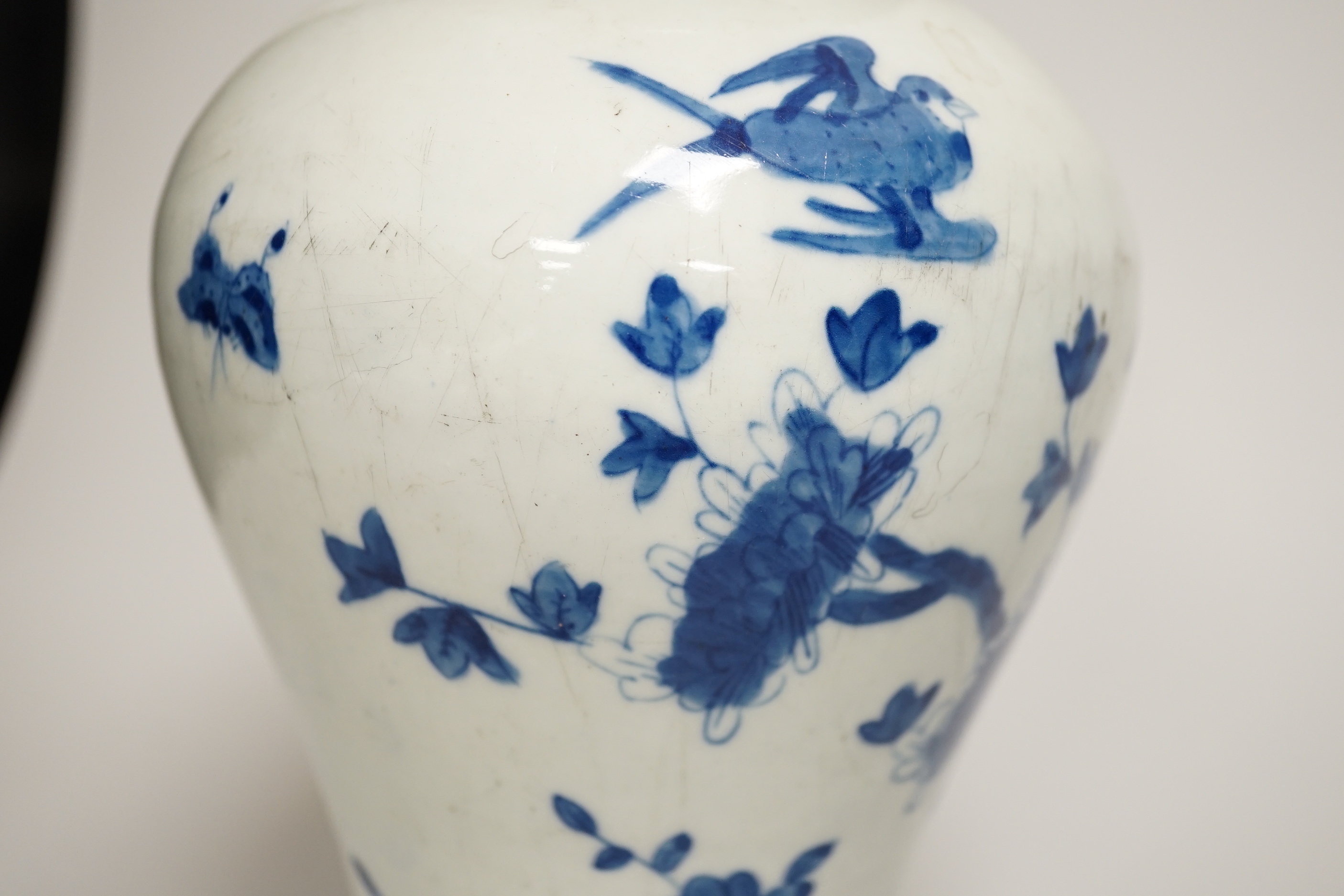 Chinese blue and white ceramics and a miniature famille rose vase, the largest 25cm high